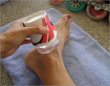 Using a cup for icing and injured ankle