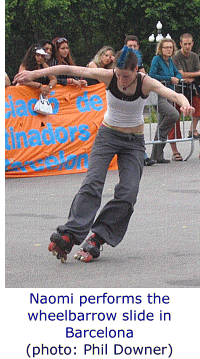 Photo of Naomi Grigg performing the wheelbarrow slide.