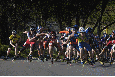 Skaters climb a hill at the Texas Road Rash